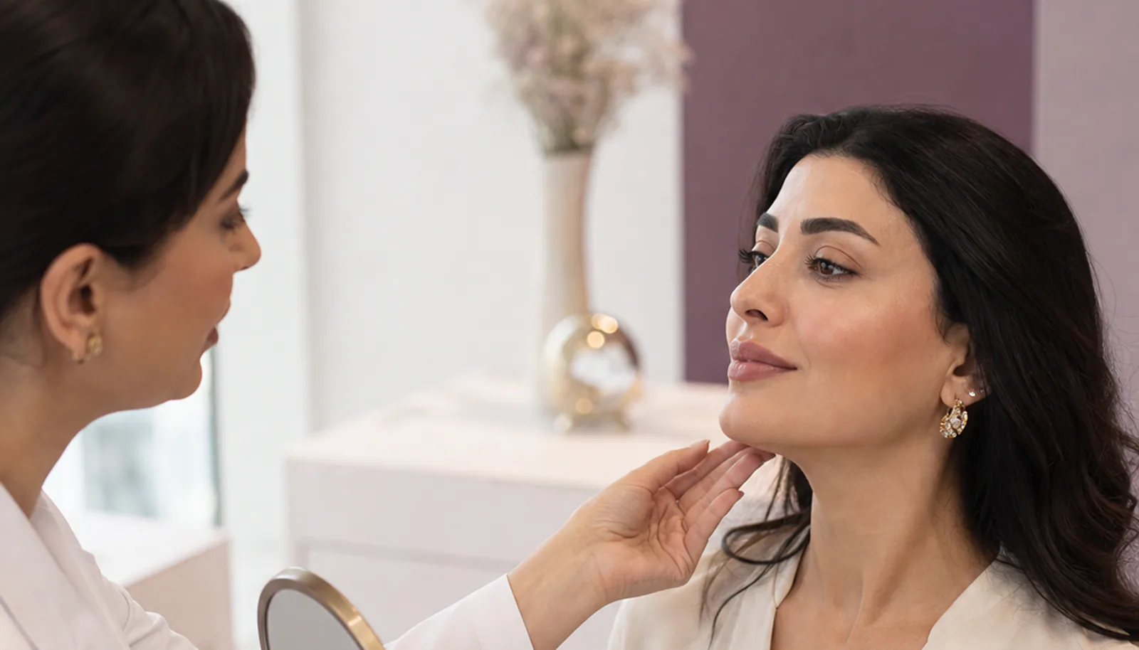 Illustrative clinician-led consultation about the neck and jawline area