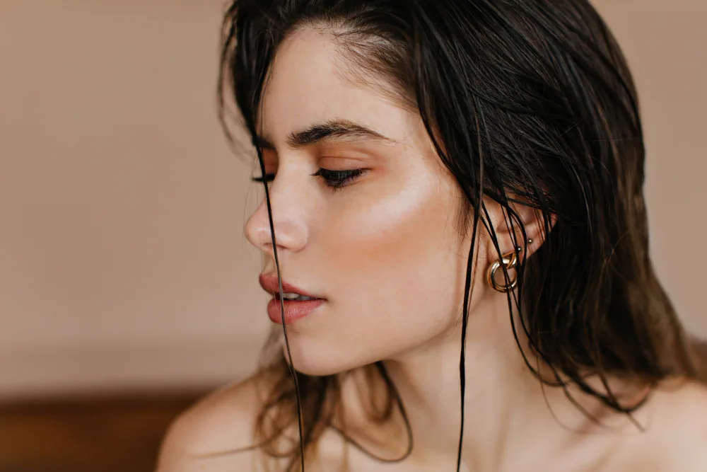 Beauty portrait showing the cheek profile and facial contour
