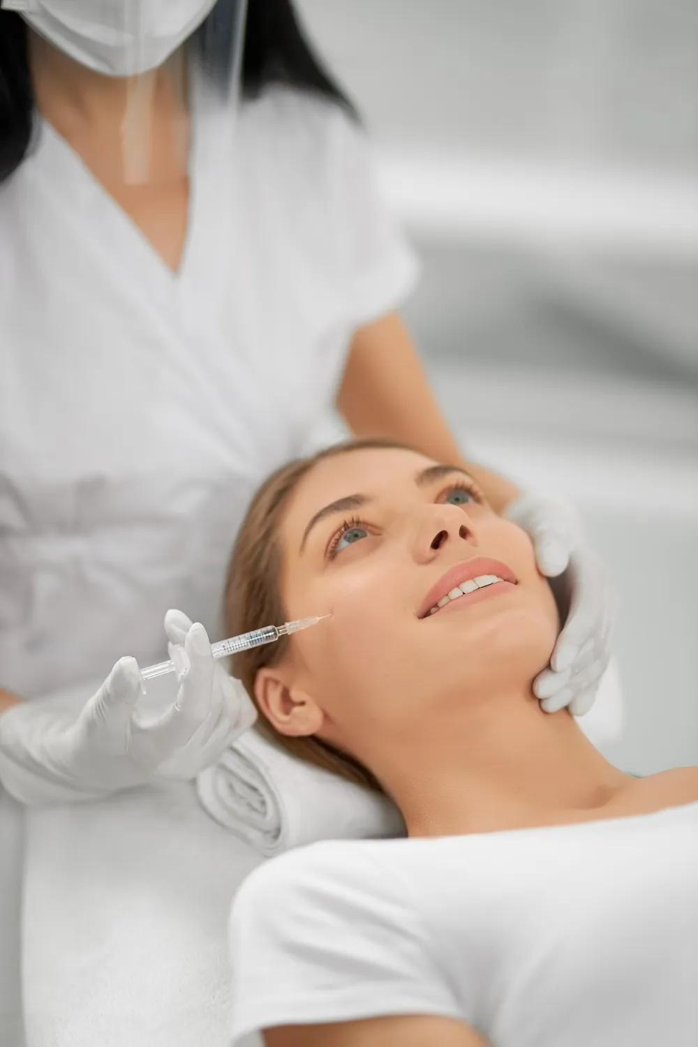 Clinician providing a precise injectable treatment